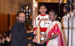The President presents the Padma Award. Between Shekhar Kapoor, S Ajit, R Ashwin