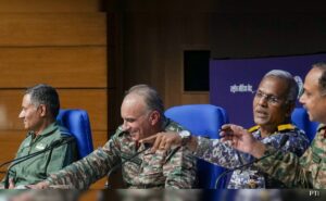 Chief General Sandeep S. Sharda’s left leg forward Quip major defense briefing